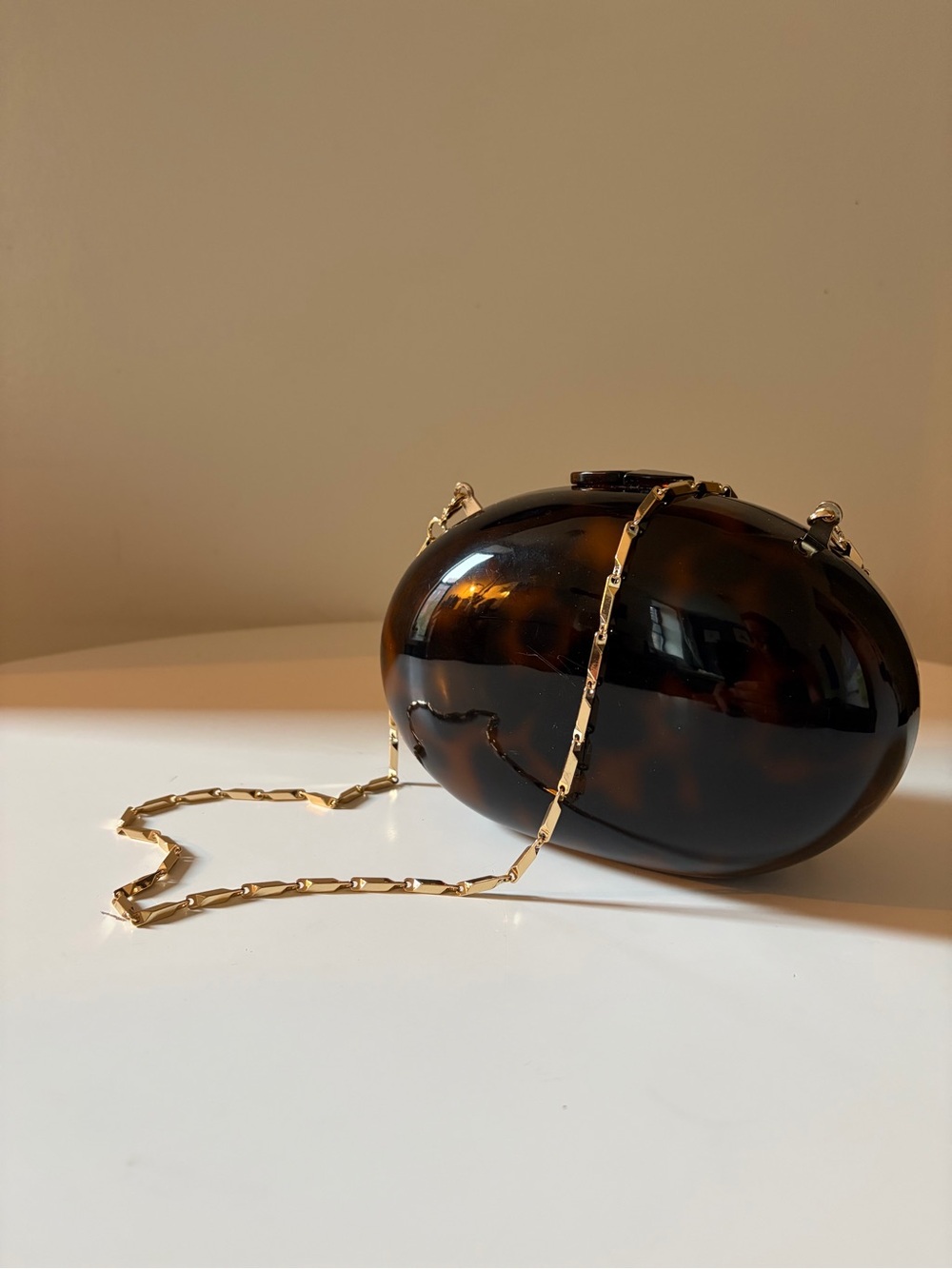 Mango Tortoiseshell Oval Clutch with Gold Chain Strap